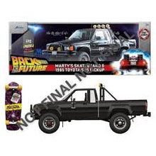 Load image into Gallery viewer, BACK TO THE FUTURE MARTY'S SKATEBOARD AND 1985 TOYOTA PICKUP DIE CAST 1/24 MODEL
