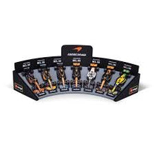 Load image into Gallery viewer, burago Formula Racing 1:43 Mclaren 7 Piece Collection with Display Stand
