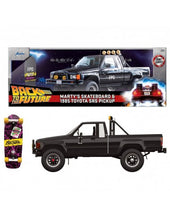 Load image into Gallery viewer, BACK TO THE FUTURE MARTY'S SKATEBOARD AND 1985 TOYOTA PICKUP DIE CAST 1/24 MODEL

